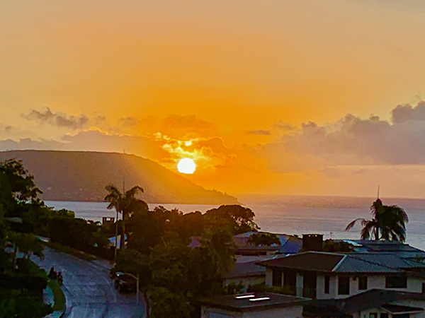 Another ho hum sunrise in Hawaii, amidst the rain and cold! ~Holly Bergosa