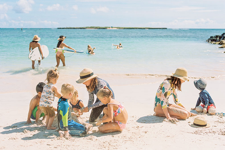 mothers with children at beach